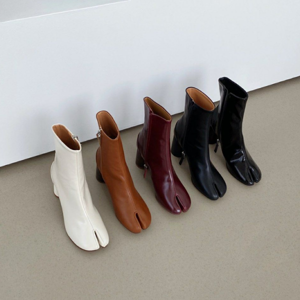 Tabi Boots: A febre do momento! Descubra tudo sobre essa bota polêmica.